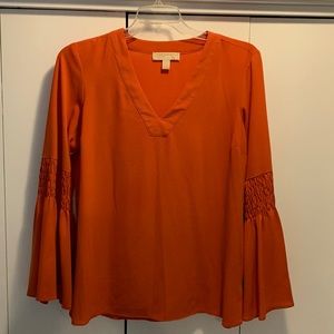 Michael Kors Top. Beautiful Top with flowing sleeves.